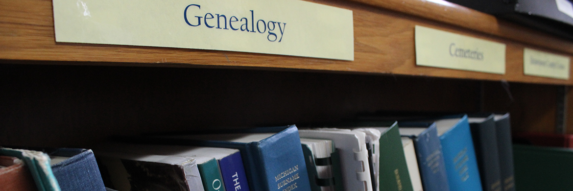 Genealogy section of library bookstacks