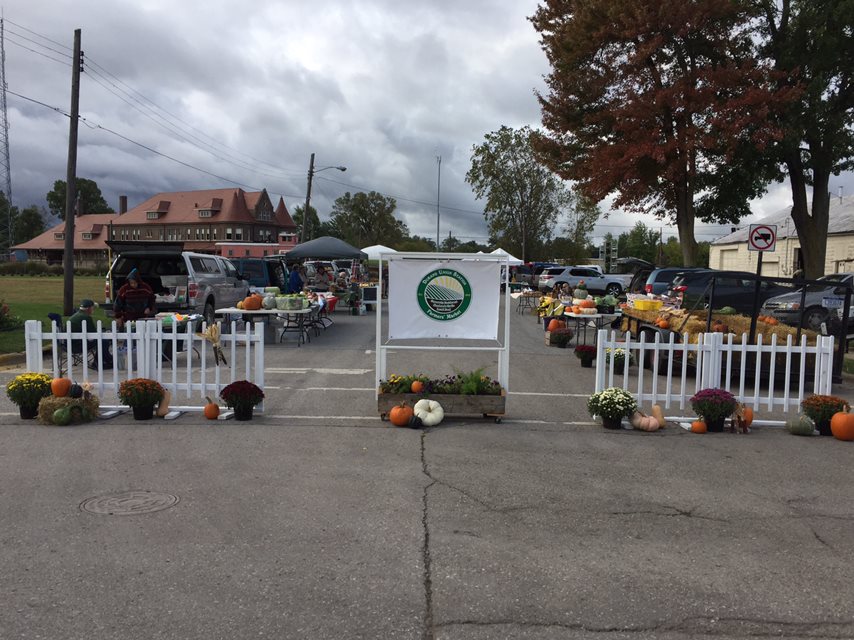 Durand Farmer's Market sign and booths
